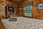 Queen Bedroom With TV